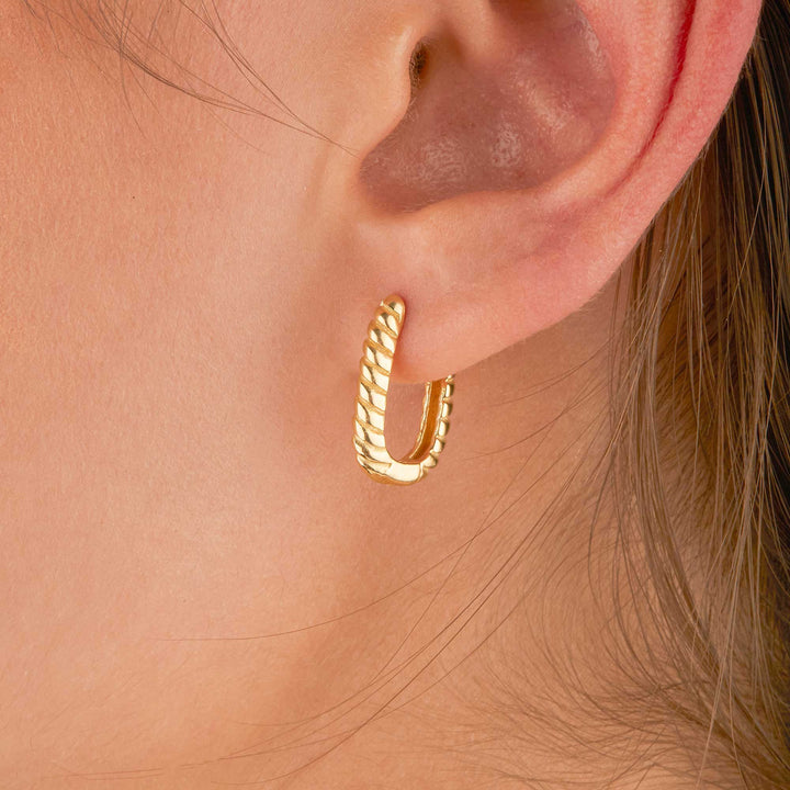 Orpah Solid Ripped Oval Huggie Earrings