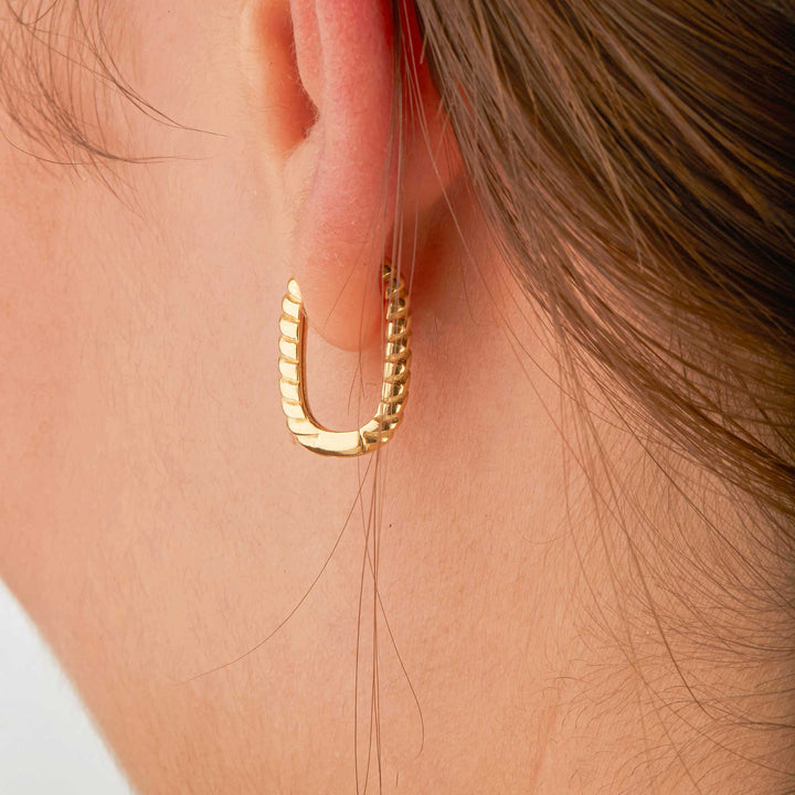 Orpah Solid Ripped Oval Huggie Earrings