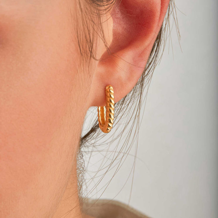 Orpah Solid Ripped Oval Huggie Earrings