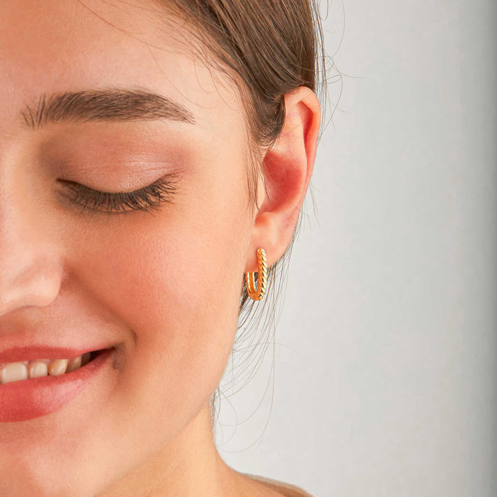 Orpah Solid Ripped Oval Huggie Earrings