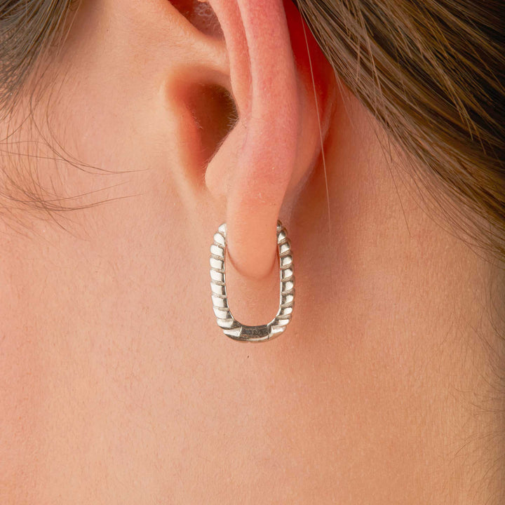 Orpah Solid Ripped Oval Huggie Earrings